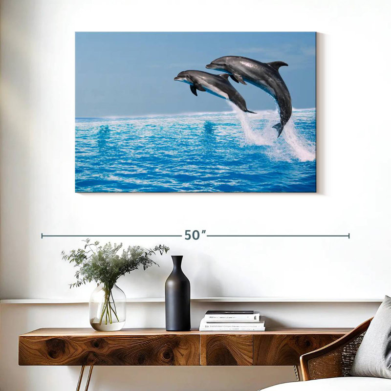 Deux dauphins bondissant