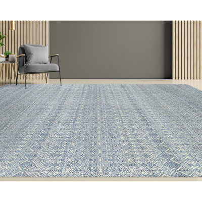 Tapis rectangulaire en laine / viscose noué à la main beige / bleu