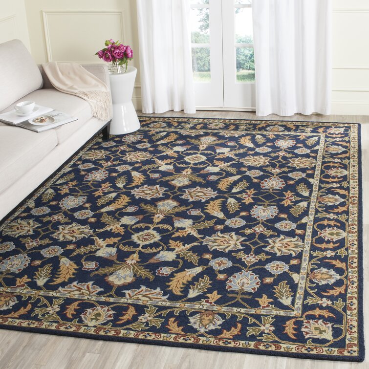 https://assets.wfcdn.com/im/85271721/resize-h755-w755%5Ecompr-r85/1097/109728740/Ferrera+Handmade+Wool+Navy+Rug.jpg