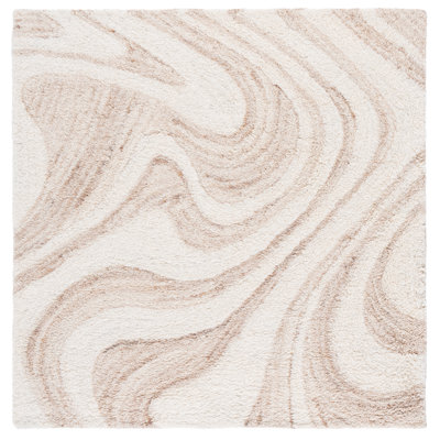 Tapis ivoire / beige en laine touffeté à la main Goldina