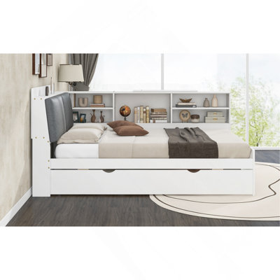 Lit plateforme en bois avec lit gigogne, tablettes et tête de lit