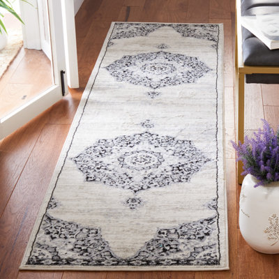 Sangster Oriental Ivory/Black Area Rug
