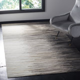 Patricio Abstract Handmade Tufted Charcoal Area Rug