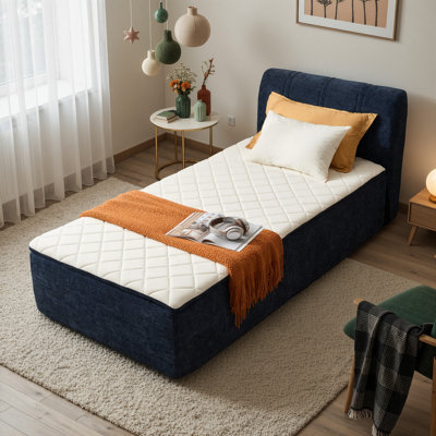 Lit plateforme tapissier avec tête de lit en chenille