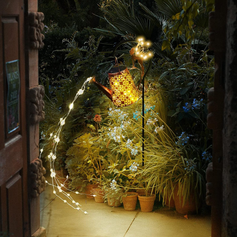 Fée, arrosoir, cascade lumineuse