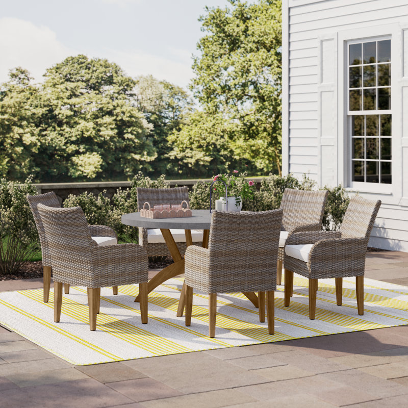 Akiva 6 - Person Teak Patio Dining Set with Round Table , Sunbrella® Cushions Included