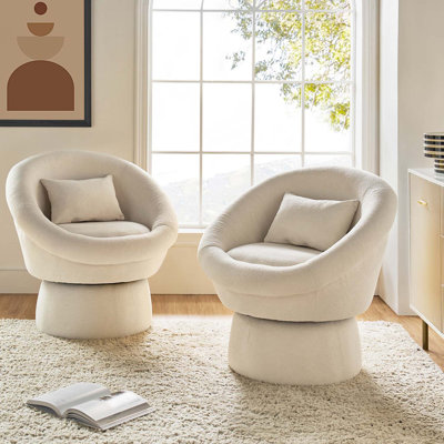 Fauteuil demi-tonneau pivotant rembourré Kizzie