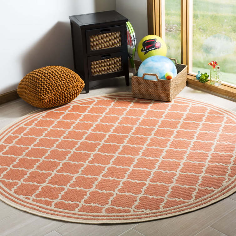 Ferrill Rust/Cream Area Rug