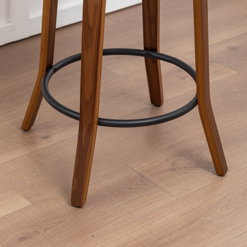 Tabouret de comptoir pivotant rembourré avec structure en bois Devaney, Vert