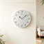 Horloges murales blanches et blanches