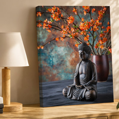 Toile, statue de Bouddha sereine posée dans une pose méditative sur un art mural, une table texturée en bois foncé entourée de branches délicates