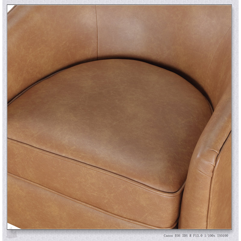 Fauteuil pivotant demi-tonneau en similicuir Maisy