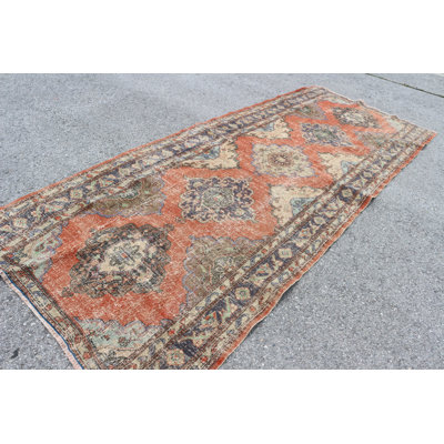 Hand-Knotted Vintage Turkish Rug in Tribal Bohemian Style Serving as a Decorative Runner for Your Home