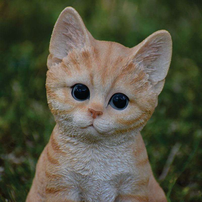 Figurine de chaton assis
