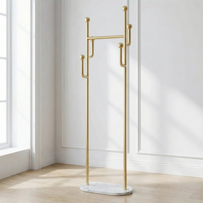 Freestanding Coat Rack With A Gold-tone Metal Frame And Marble Base, Suitable For Hats, Scarves, Jackets, And More