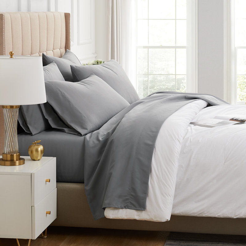 Ensemble de draps Southshore Basics de Southshore Fine Linens, gris acier, en microfibre doublement brossée 100 g/m², poches profondes de 40 cm, comprenant 1 drap-housse, 1 drap plat et 4 taies d'oreiller, taille standard.