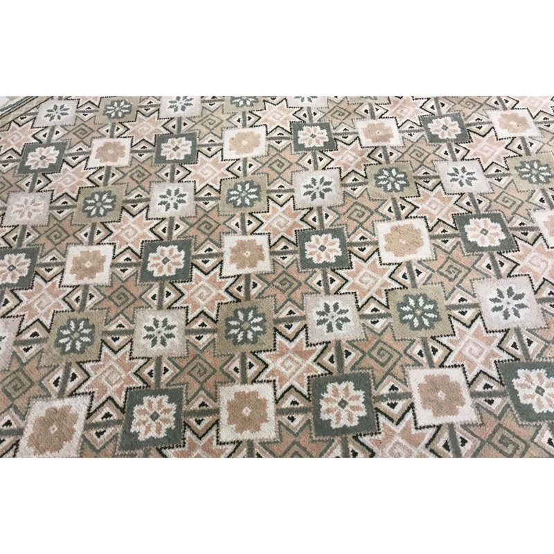 Tapis beige noué à la main de haute qualité