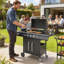 Outsunny 4 - Burner Freestanding, Portable 51800 BTU BTU Gas Grill with Side Burner and Cabinet