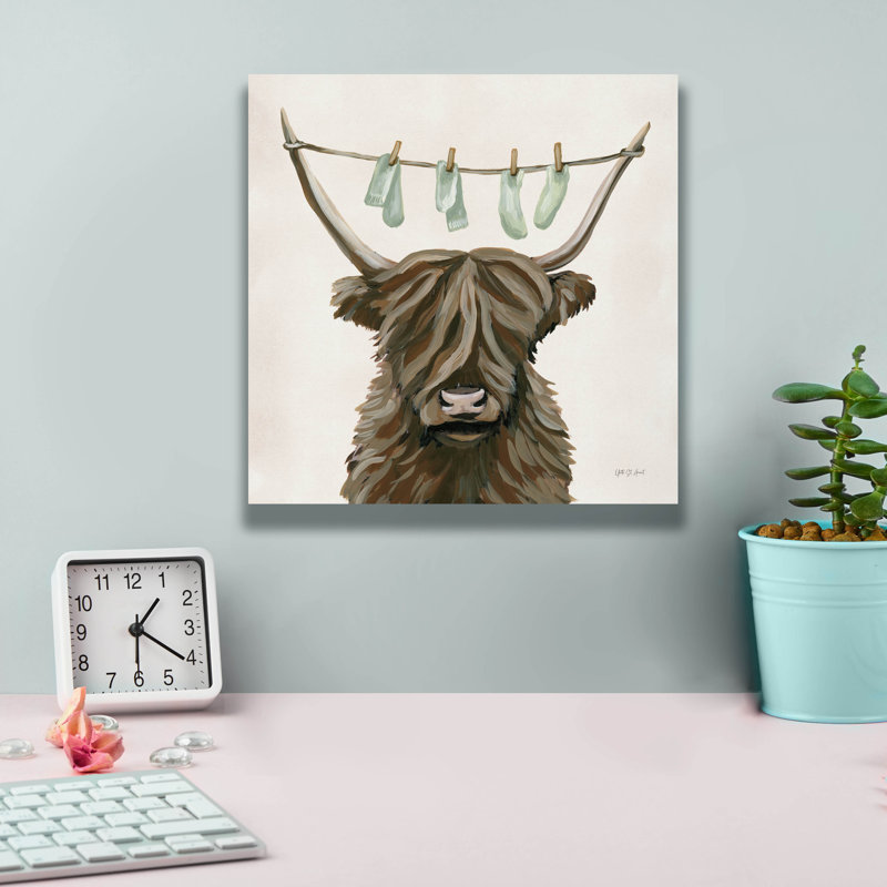 «Highland Cow, corde à linge» par Yvette St. Amant, art mural sur toile, H 12 po x l 12 po x P 0,75 po