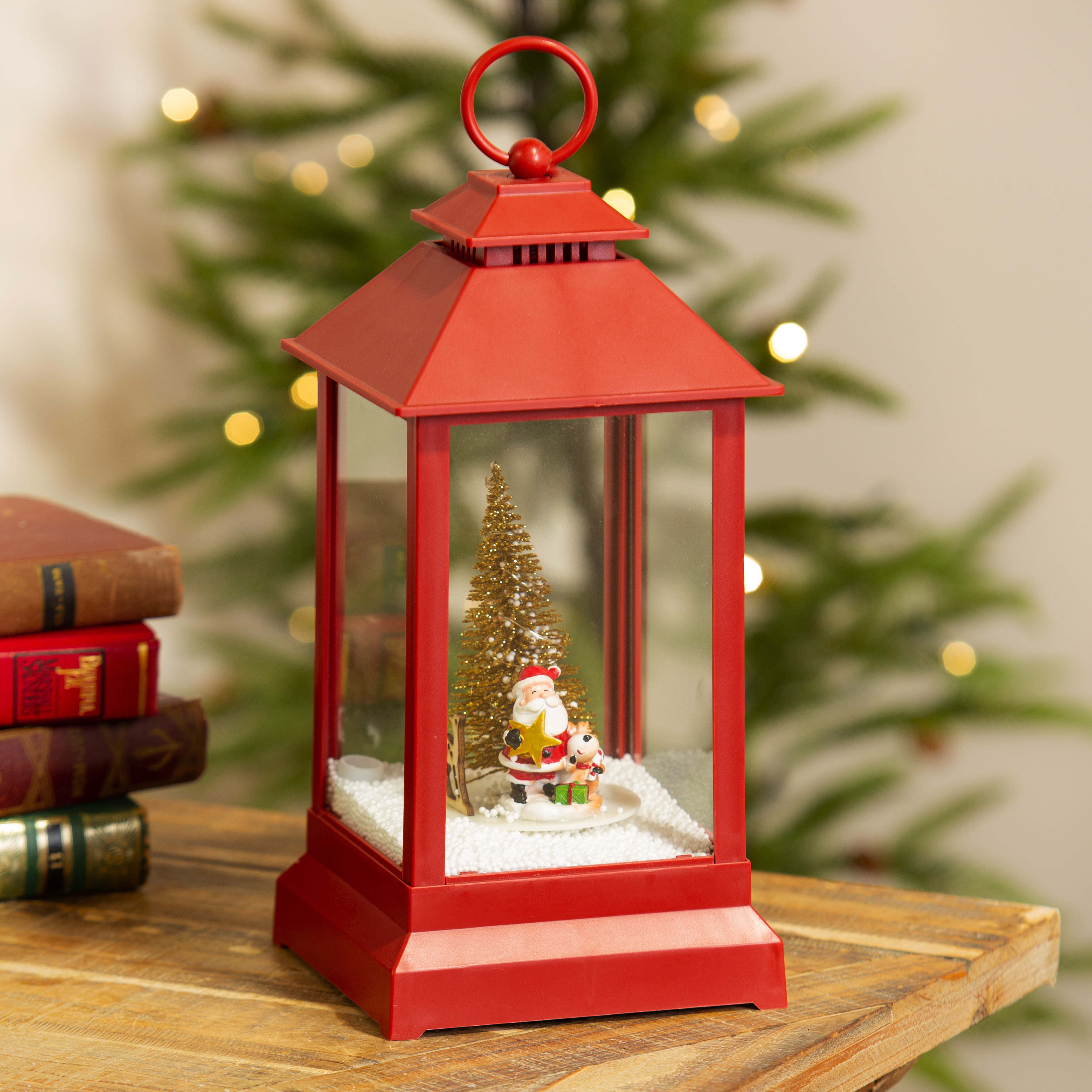 https://assets.wfcdn.com/im/85368915/compr-r85/2586/258605795/12-led-lantern-with-rotating-christmas-scene-faux-snow-and-music.jpg