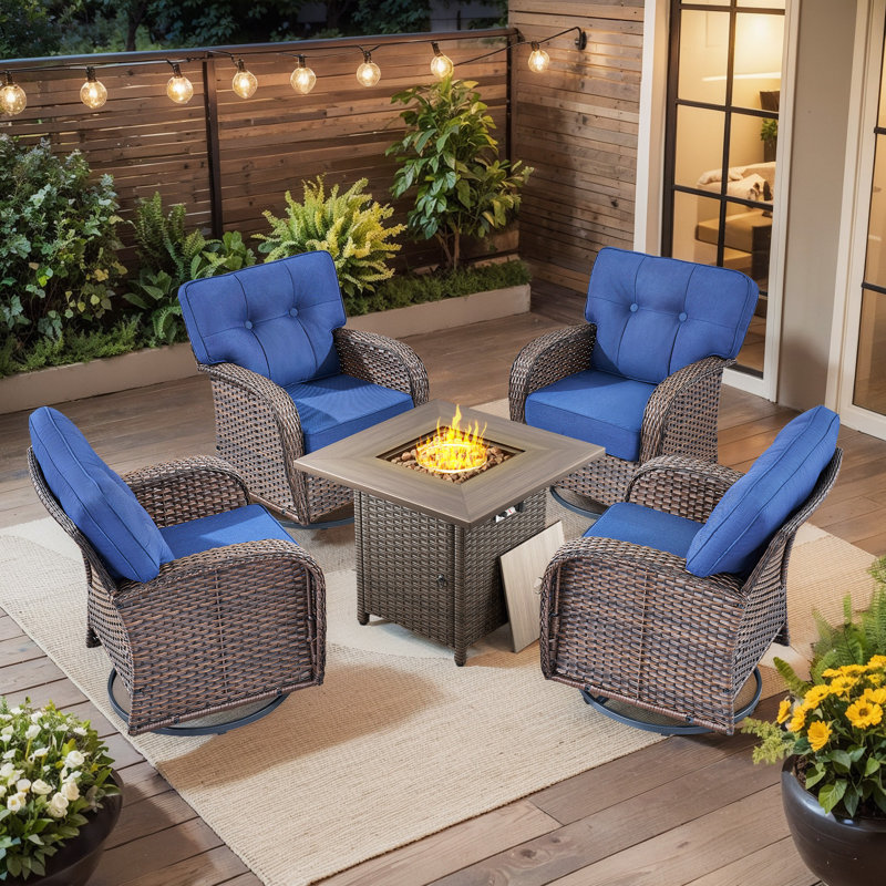 Ensemble de conversation pivotant en rotin pour 4 personnes avec coussins et table de foyer d'extérieur Fiorillo, Bleu