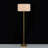 59.8'' Modern Floor Lamp with Wavy Metal Accent and Fabric Drum Shade