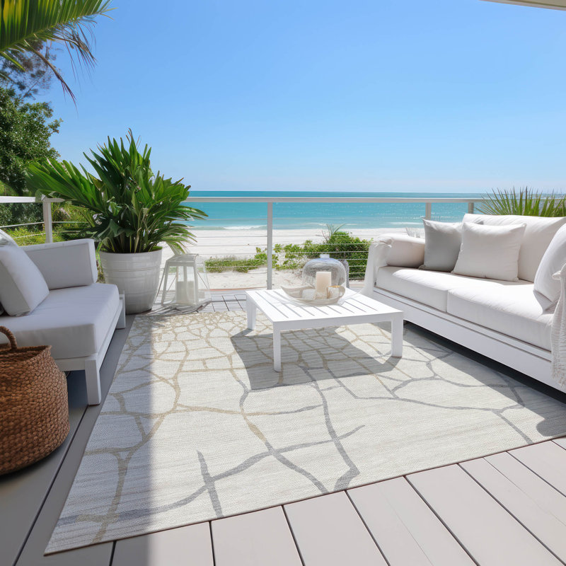Ivory and Beige Flat Woven Synthetic Area Rug