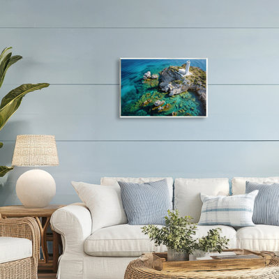 Plaque murale phare avec roches au bord de la mer, design par Don Schwartz