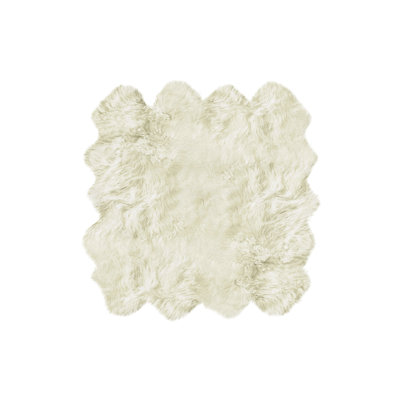Novelty Colello Solid Color Handmade Sheepskin 7' x 6' Area Rug in Natural