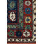 Seychour Wool Oriental Area Rug in Green/Red