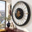Horloge murale avec pignons en mouvement