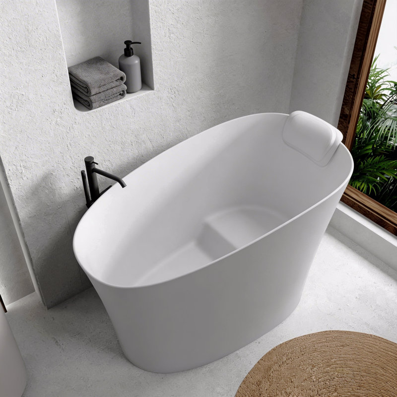 Baignoire autoportante ovale de 51 po à surface solide blanche brillante avec trop-plein et bonde, avec siège et appui-tête intégrés