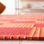Della Area Rug in Red / Rust-1192373764