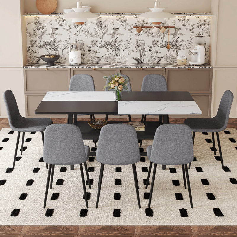Ensemble de table et de chaises de 71 x 35,4 pouces et table de salle à manger avec fonction de rangement au milieu des pieds de la table.
