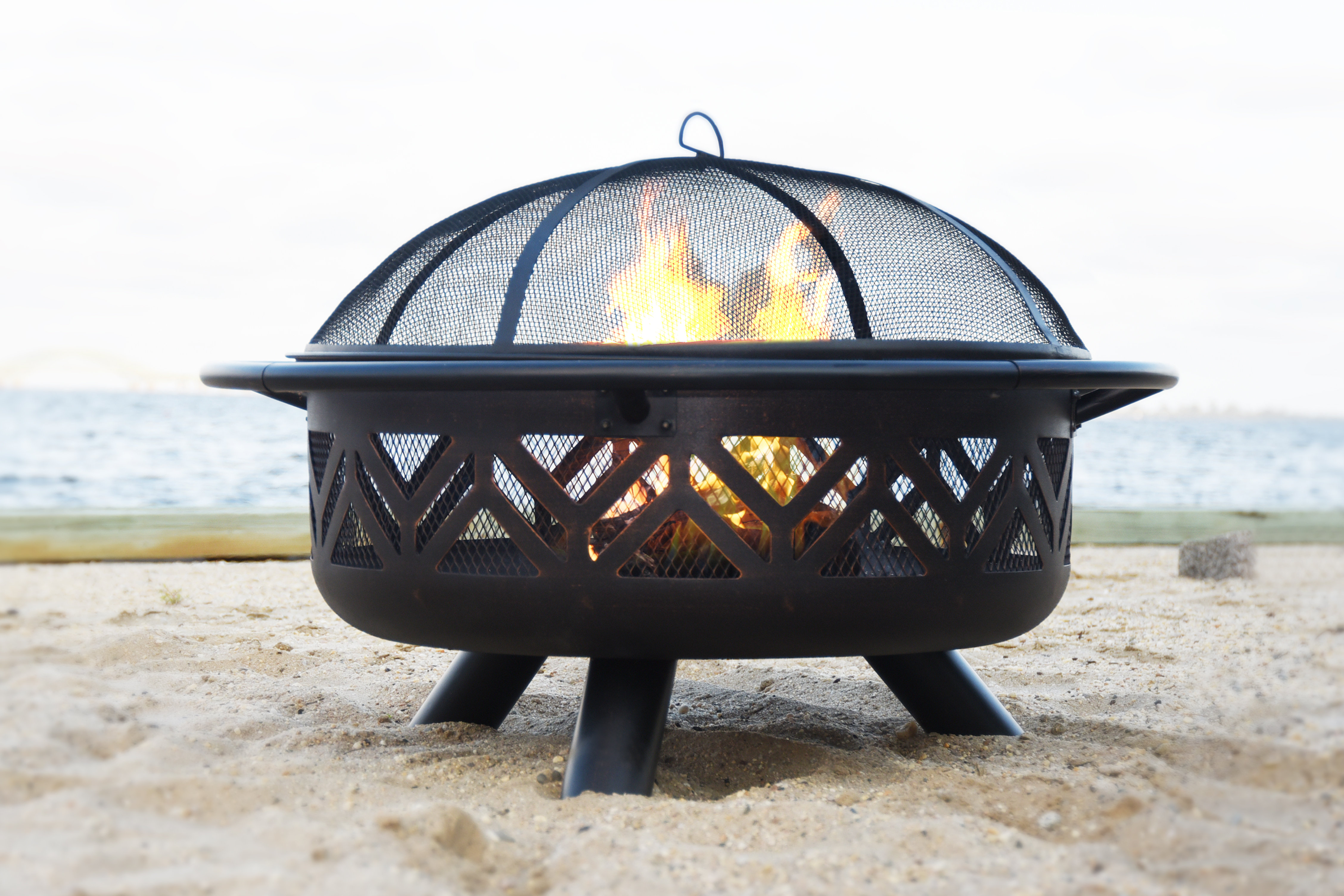 https://assets.wfcdn.com/im/85421529/compr-r85/2215/221587749/joy-by-endless-summer-30-oil-rubbed-bronze-wood-burning-outdoor-firebowl-with-geometric-design.jpg