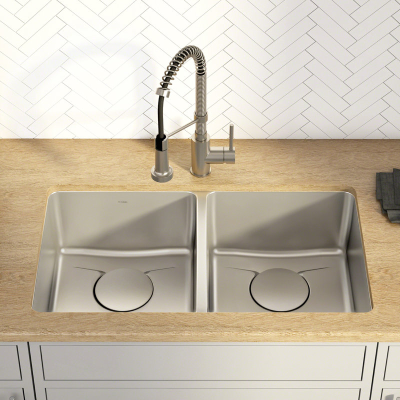 Évier de cuisine encastrée en acier inoxydable de calibre TRU16 à double cuve 50/50 avec DrainAssure de la collection Dex™ par KRAUS