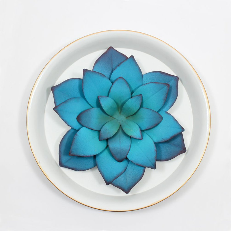 Décoration murale plante grasse sur une assiette