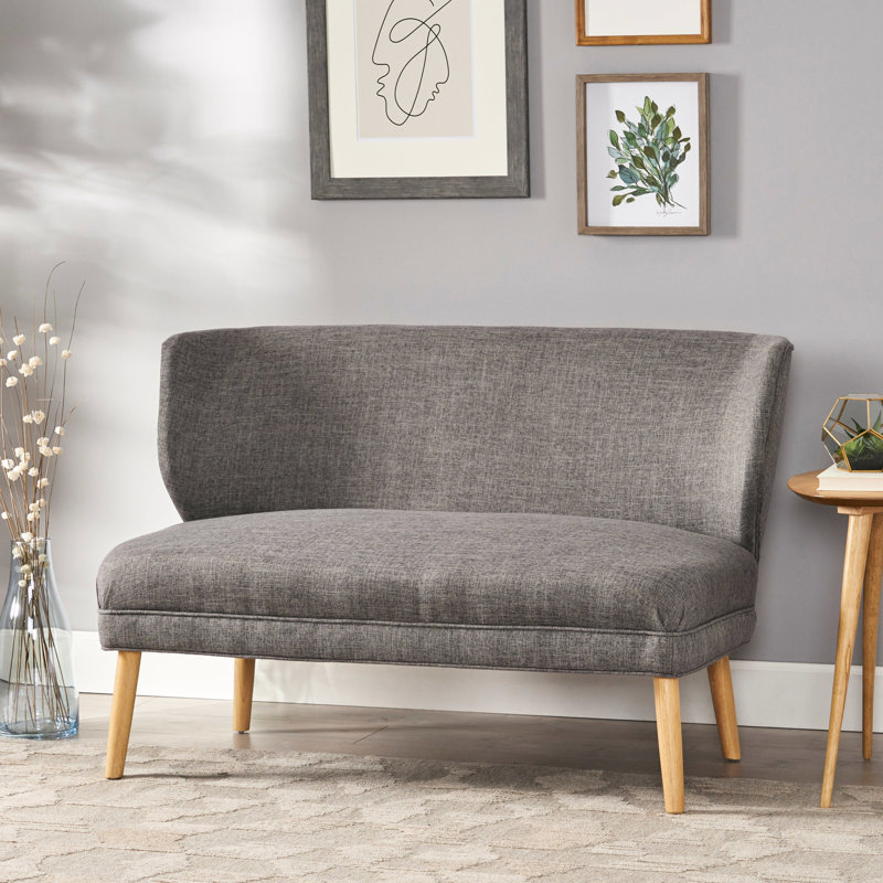 Charmante chaise rembourrée beige pour la décoration intérieure en bleu assise relaxante