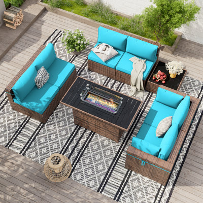 Ensemble de conversation modulaire en rotin Babak avec foyer et table basse