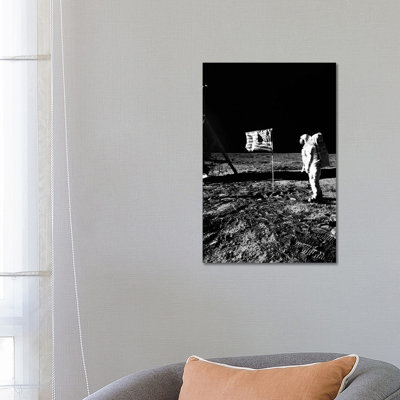 1969 Astronaut US Flag And Leg Of Lunar Lander On The Surface Of The Moon by Vintage Images - Wrapped Canvas Print