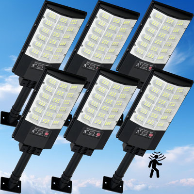 Lampadaires solaires d'extérieur avec capteur de mouvement et télécommande, lumière d'inondation imperméable Dusk To Dawn 6500K pour le stationnement, le garage, la cour et les allées