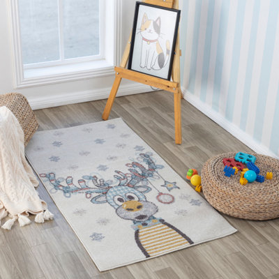 Beyanka Animal Print Machine Tufted Area Rug