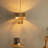 Bradlyn 4-Light Coastal Chandelier 3-Tier Handwoven Multi Color Ceiling Light In Brass
