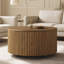 Table basse ronde cannelée en forme de tambour avec roulettes et deux tiroirs de rangement dissimulés-1097660696