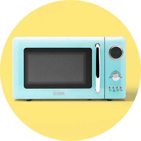 A light blue retro-style countertop microwave with a silver handle and dial, on a circular yellow background.