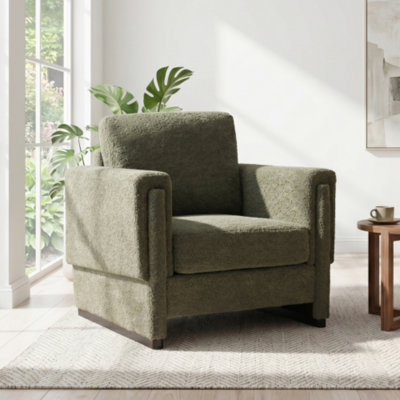 Fauteuil club à accoudoirs carrés en boucle verte, monobloc, accoudoirs en bois massif, coussin épais, piètement luge, pieds en bois d'hévéa