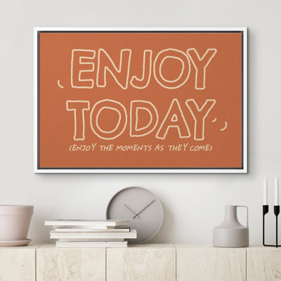 «Enjoy Today», reproduction d'art sur toile encadrée dans la chambre principale
