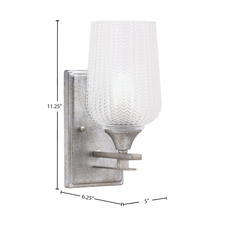 Uptowne Wall Sconce Shown In Aged Silver Finish With 5" Textured Glass, Clear