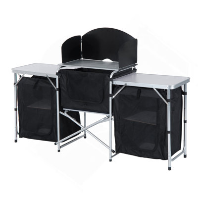Portable Aluminum Camping Kitchen Table With Windscreen And Storage, Perfect For BBQ, Picnics, And Outdoor Gatherings.