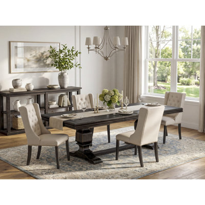 Cet ensemble de cuisine de 5 pièces comprend une table en bois et 4 chaises de cuisine en tissu de lin crème et des pieds noirs avec dossier capitonné - finition noir sablé.